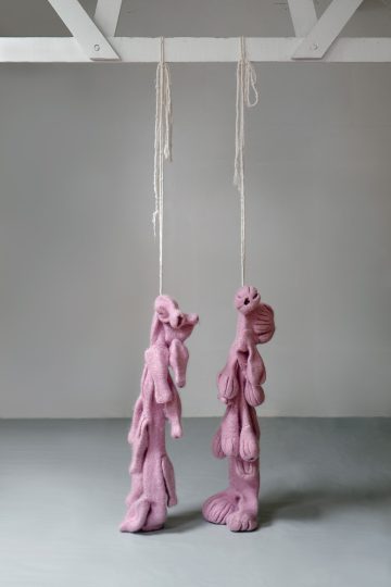 Mr and Mrs Pope knitted, shrunk and hung 2012