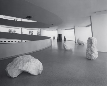 Installation view with White Arch (1979), Large White Column (1979), Bent White Lump (1979), Tall Wood Block (1978), Round Pile (1979) and Apple Pile (1978), Guggenheim Museum, New York, 1979