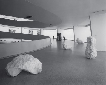 Installation view with White Arch (1979), Large White Column (1979), Bent White Lump (1979), Tall Wood Block (1978), Round Pile (1979) and Apple Pile (1978), Guggenheim Museum, New York, 1979