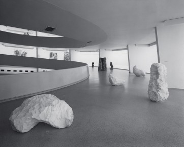 Installation view with White Arch (1979), Large White Column (1979), Bent White Lump (1979), Tall Wood Block (1978), Round Pile (1979) and Apple Pile (1978), Guggenheim Museum, New York, 1979
