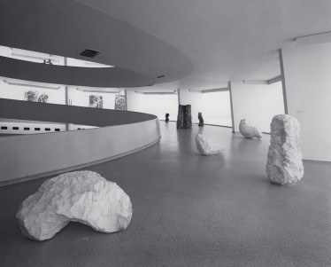 Installation view with White Arch (1979), Large White Column (1979), Bent White Lump (1979), Tall Wood Block (1978), Round Pile (1979) and Apple Pile (1978), Guggenheim Museum, New York, 1979