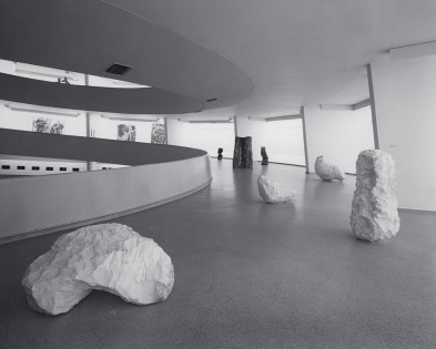Installation view with White Arch (1979), Large White Column (1979), Bent White Lump (1979), Tall Wood Block (1978), Round Pile (1979) and Apple Pile (1978), Guggenheim Museum, New York, 1979